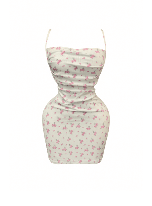 دريس قصير بطبعه الزهور ومزود بقصه من الضهر