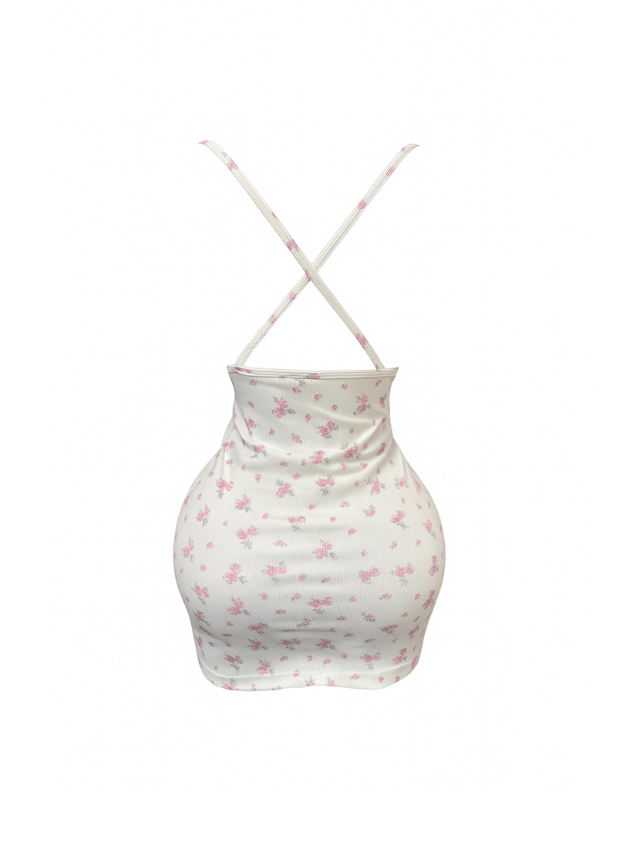 دريس قصير بطبعه الزهور ومزود بقصه من الضهر